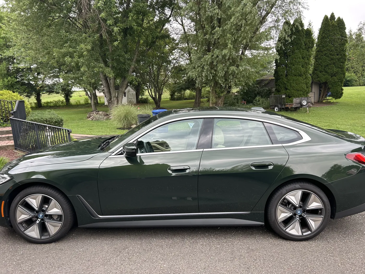 Detailed BMW i4 side profile, mirror-gloss paint